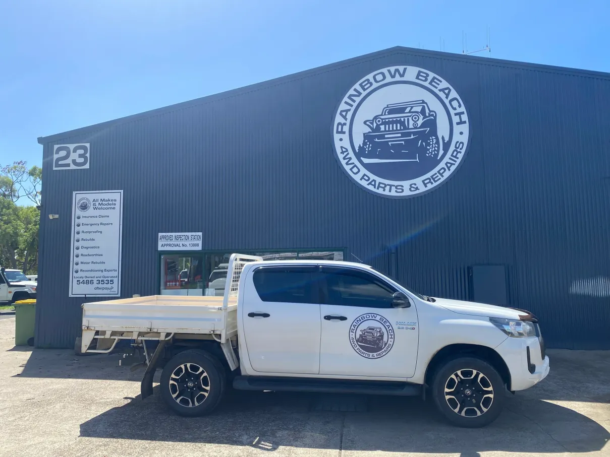 Rainbow Beach 4WD Parts & Repairs workshop at 23 Karoonda Road with the branded work ute out front